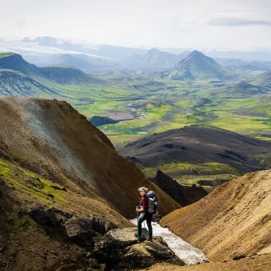 Hiker in a volcanic valley